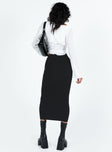 Black midi skirt Ribbed knit material Twist detail at waist Good stretch Unlined 