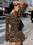 side view of model wearing Princess Polly Raquela Wrap Mini Dress Leopard V-Neck 