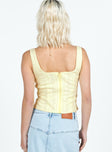 Crop top, square neckline Fixed shoulder straps, zip fastening at back