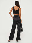 Black Matching satin set Crop top, shirred back, invisible zip fastening at side, fixed shoulder straps High-rise pants, elasticated waistband, wide leg, zip and button fastening