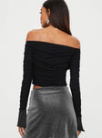 Long sleeve top Slim fitting, mesh material, off the shoulder design Ruched throughout, inner silicone strip at neckline