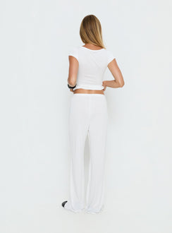 back view of model wearing Princess Polly Gavrielle Jersey Wide Leg Pants White Mid Rise Pants 
