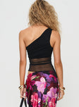 back view of model wearing Princess Polly Gilda Asymmetric Top Black Sleeveless Asymmetric Neckline 