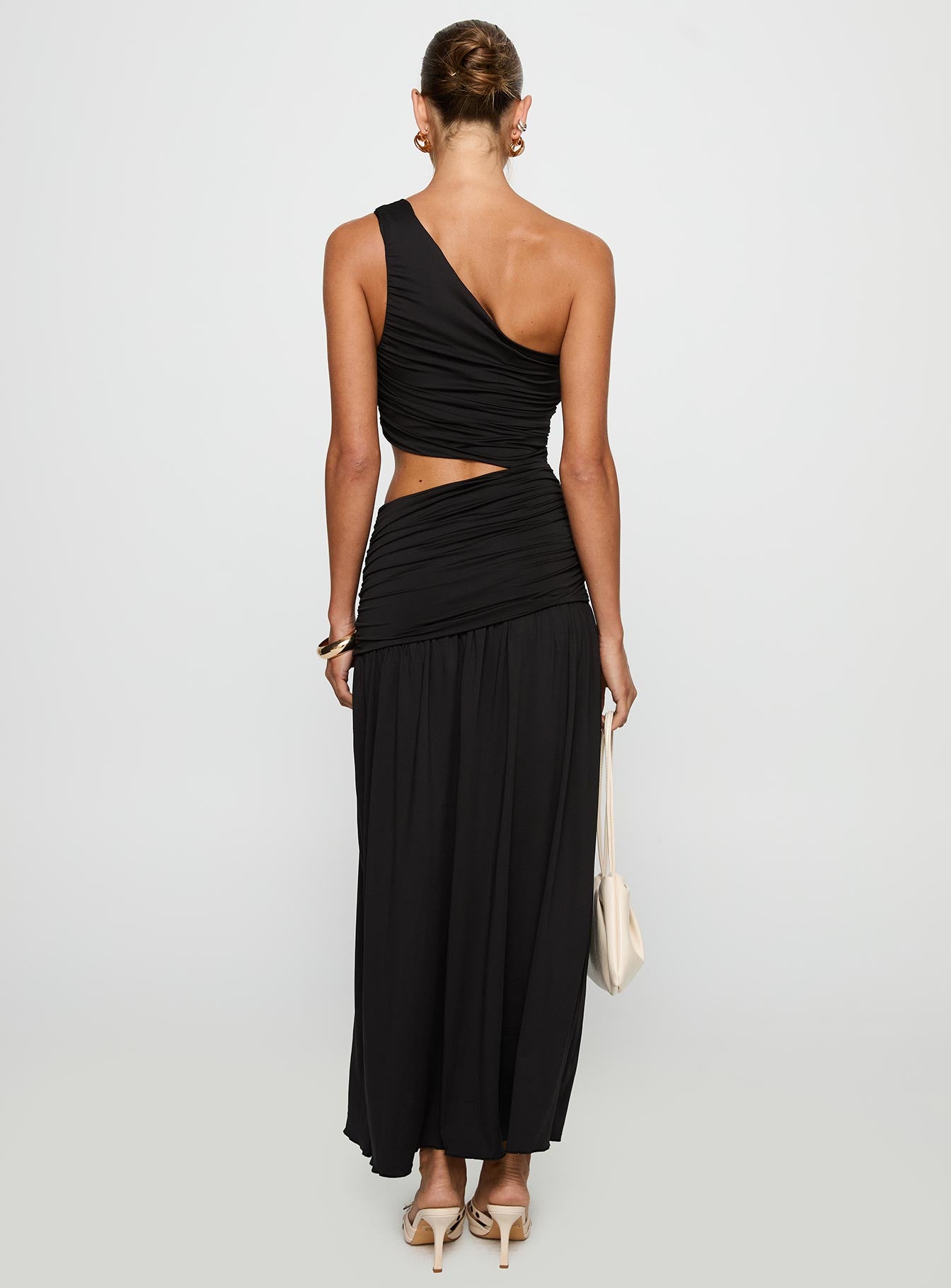 back view of model wearing Princess Polly Magnetize Ruched Maxi Dress Black Asymmetric Neckline 