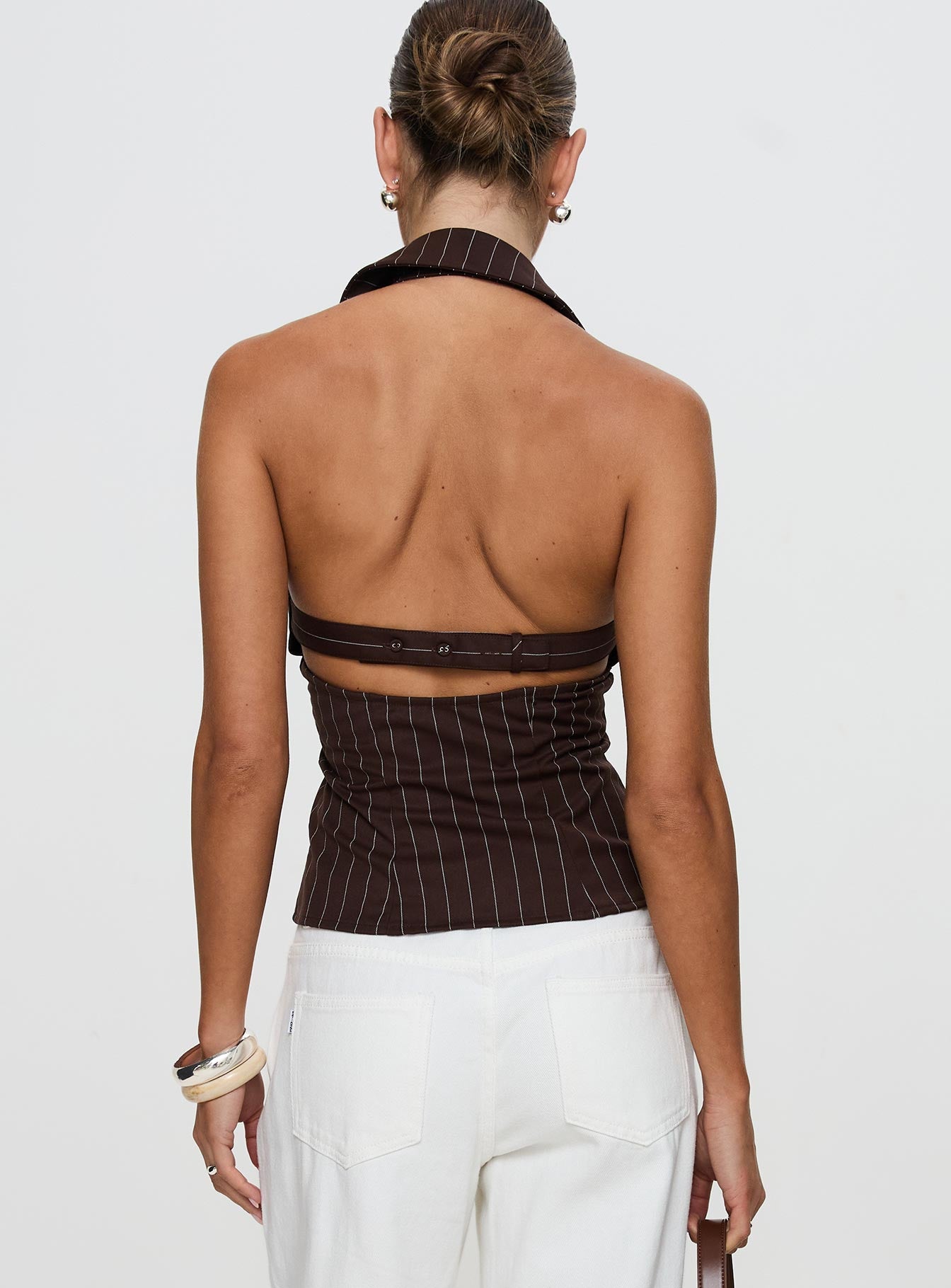 back view of model wearing Princess Polly Victorie Halter Top Chocolate Stripe Sleeveless Plunger 