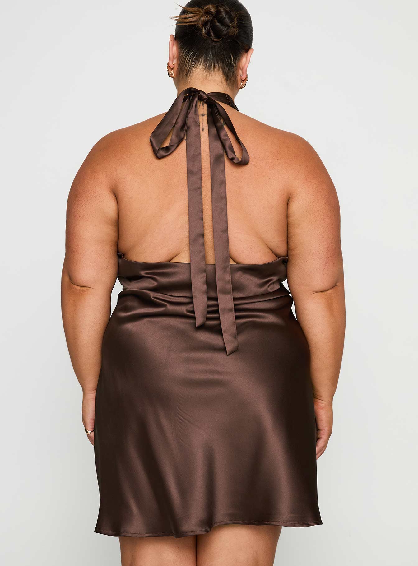 back view of model wearing Princess Polly Pelagia Halter Scarf Tie Mini Dress Brown Curve Plunger 