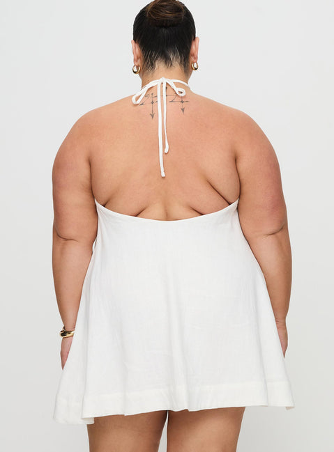 back view of model wearing Princess Polly Thomasina Linen Halter Dress White Curve 