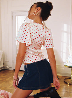 back view of model wearing Princess Polly Adrienna Flutter Blouse White / Red Short Sleeves Sweetheart 