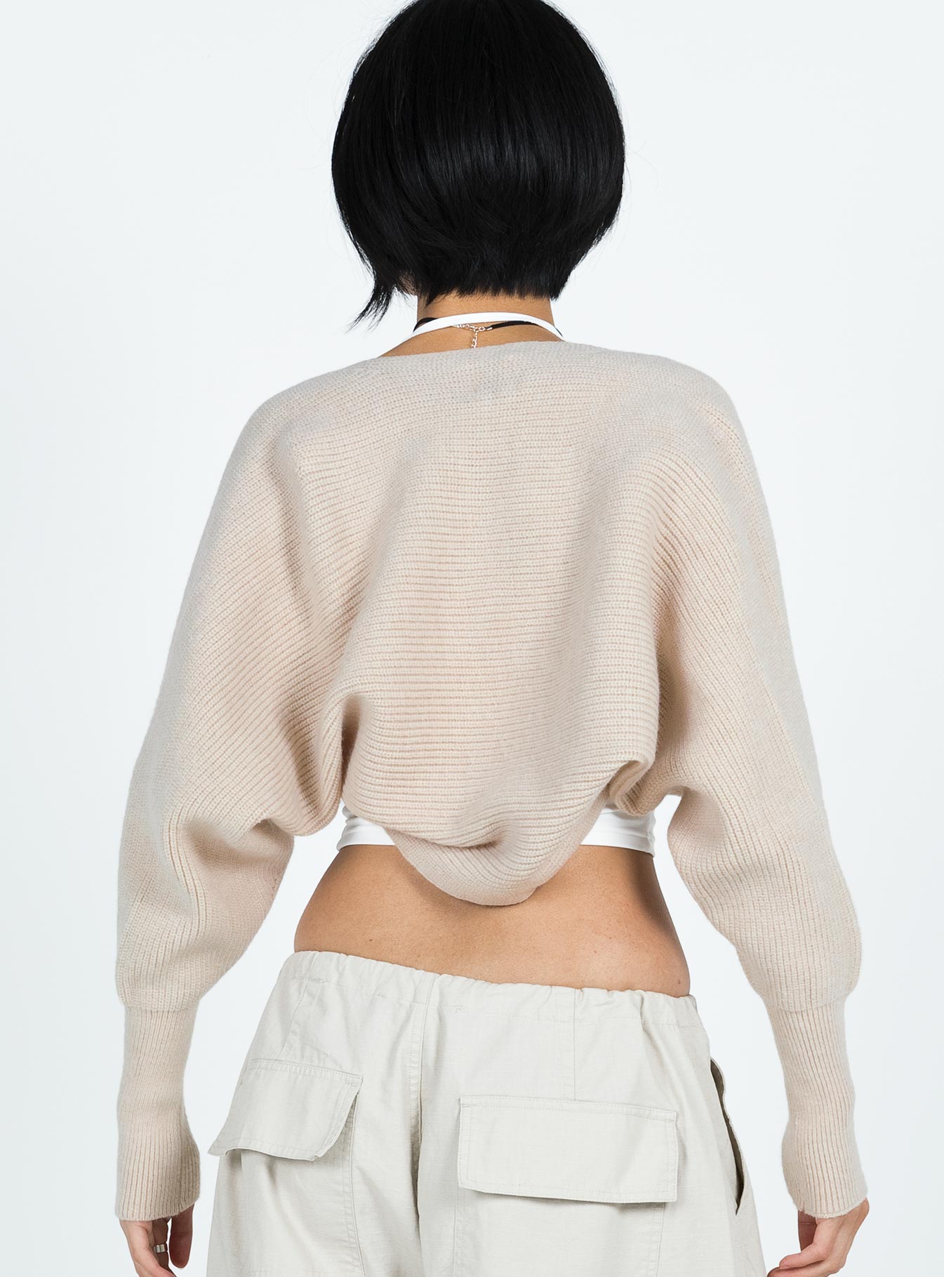 back view of model wearing Princess Polly Aviana Cardigan Beige Marle cropped 