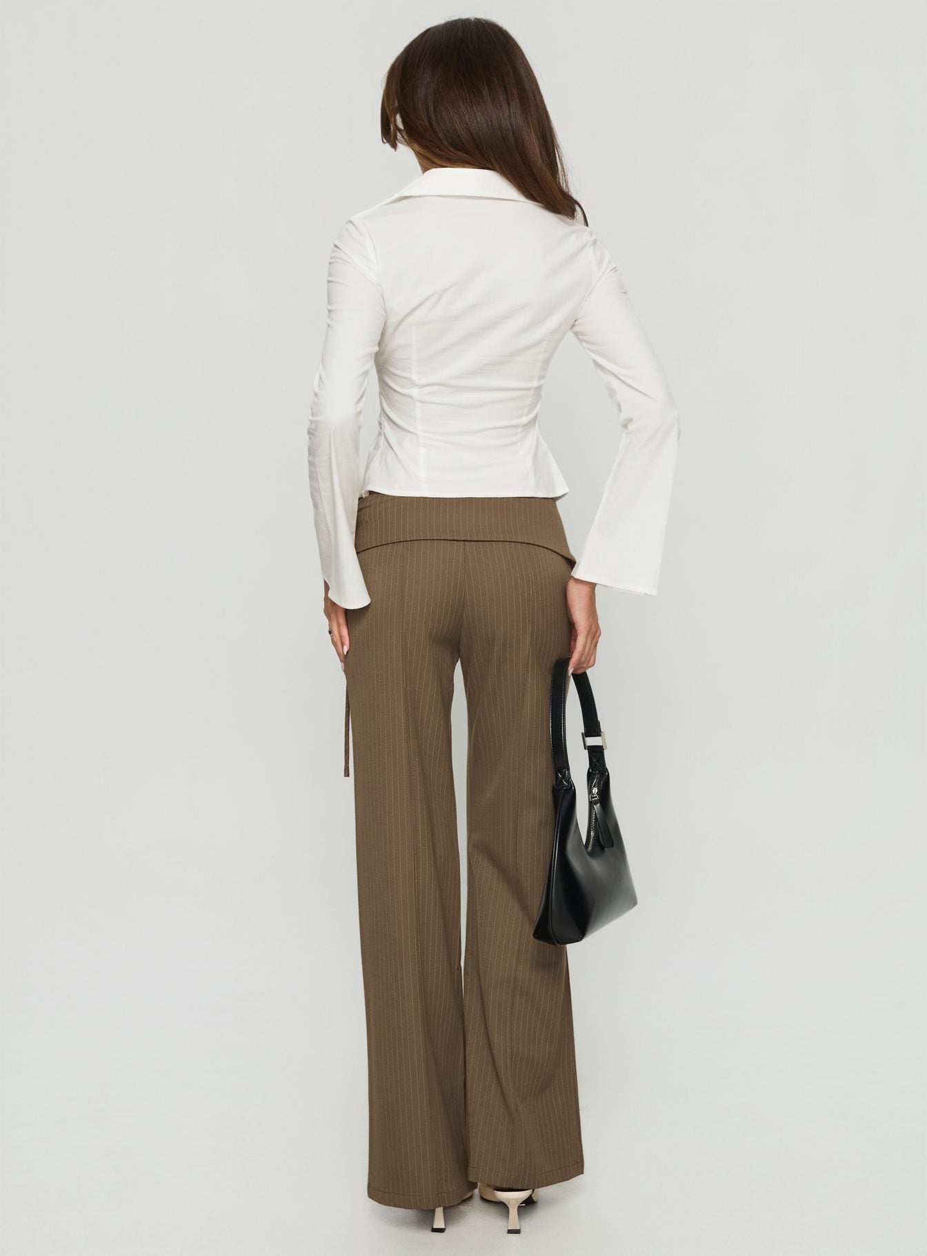 back view of model wearing Princess Polly Cedrina Eyelet Fitted Suit Pants Green Pinstripe Low Rise Pants 