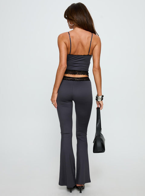back view of model wearing Princess Polly Georganna Lace Trim Flare Pant Charcoal High Rise Pants 