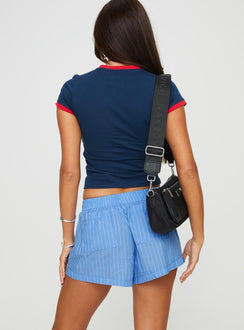 back view of model wearing Princess Polly Maxxy Boxer Shorts Blue Stripe High Waisted Shorts 