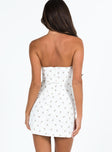 Strapless mini dress Floral print Ribbon detail at bust Invisible zip fastening at back