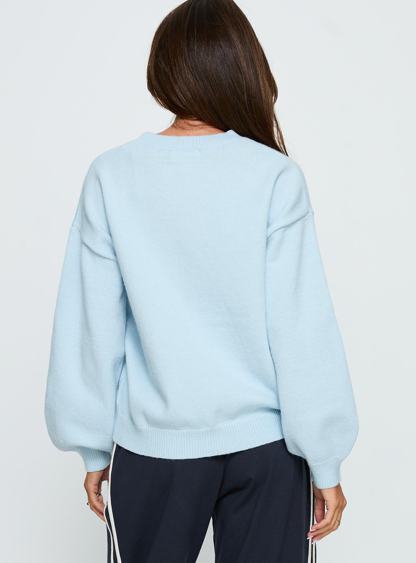 back view of model wearing Princess Polly Ranee Graphic Knit Sweater Blue 