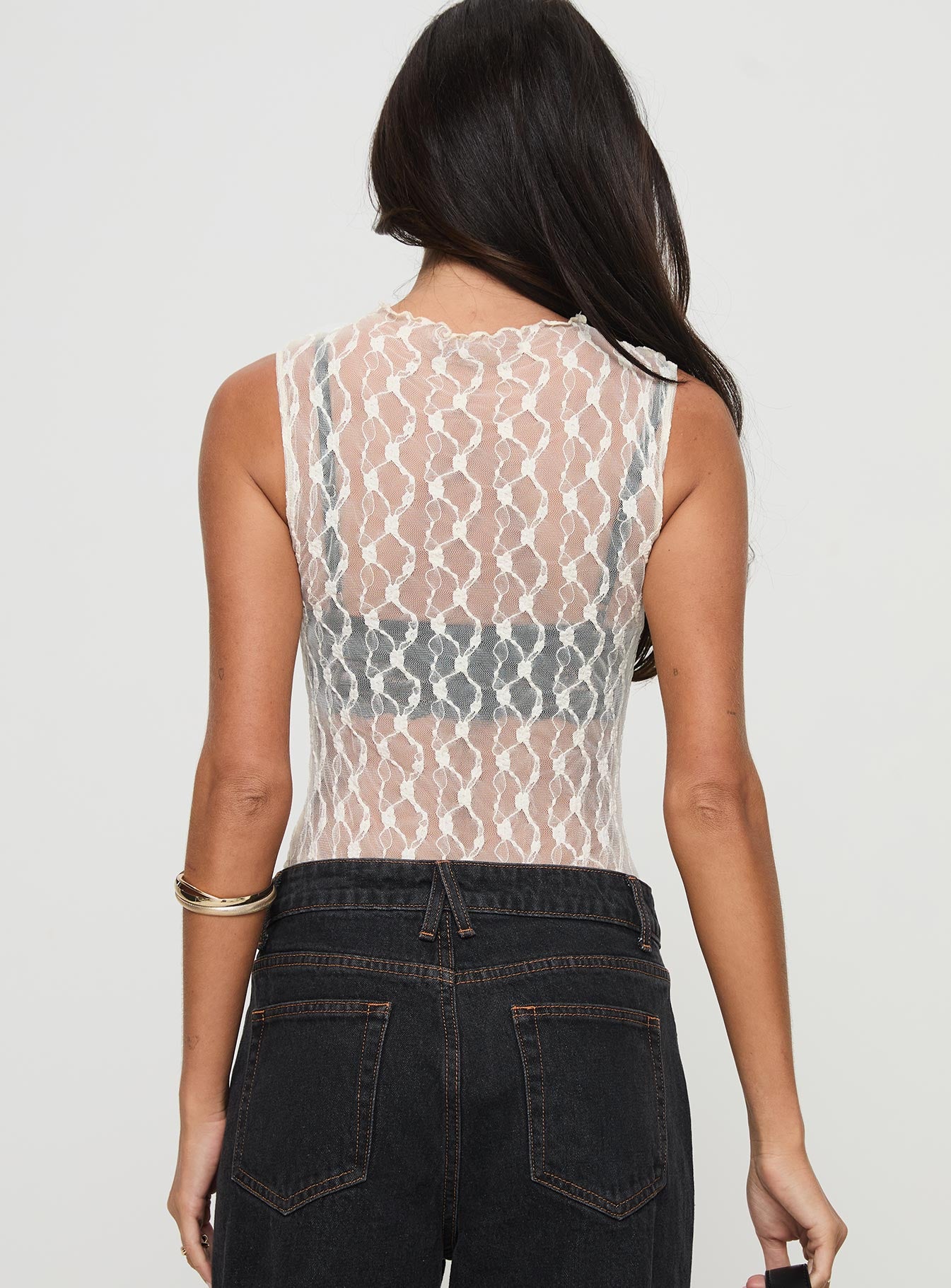 back view of model wearing Princess Polly Liedman Bodysuit Cream Sleeveless 