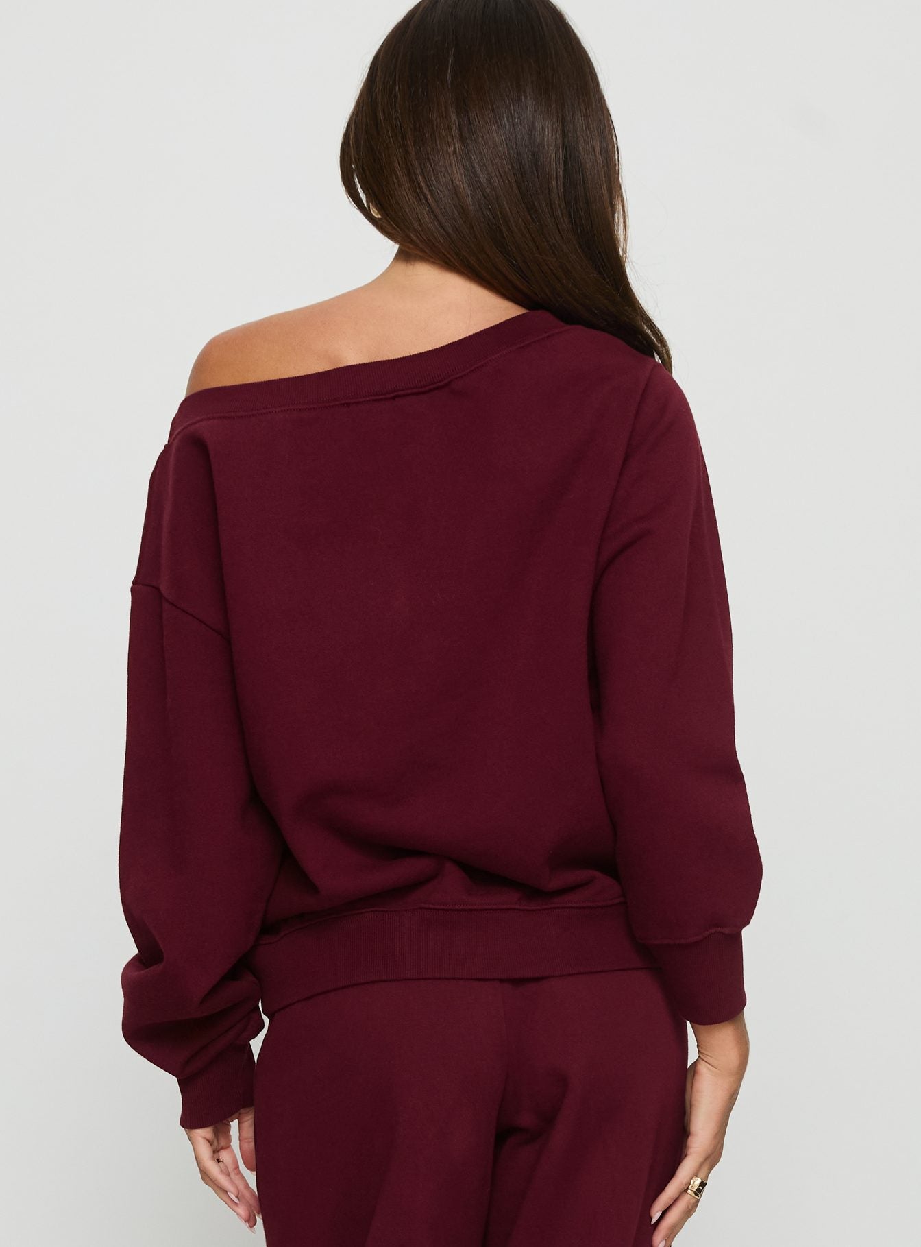back view of model wearing Princess Polly Wellness Off the Shoulder Jumper Currant 
