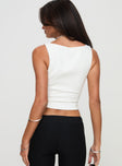 back view of model wearing Princess Polly C U Girl Top White Sleeveless Plunger 