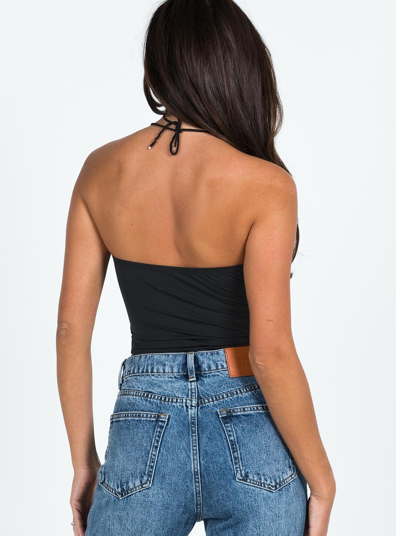 back view of model wearing Princess Polly Devra Strapless Bodysuit Black Sleeveless straight 