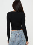 back view of model wearing Princess Polly Jakob Long Sleeve Top Black Full Sleeves Boat Neck 