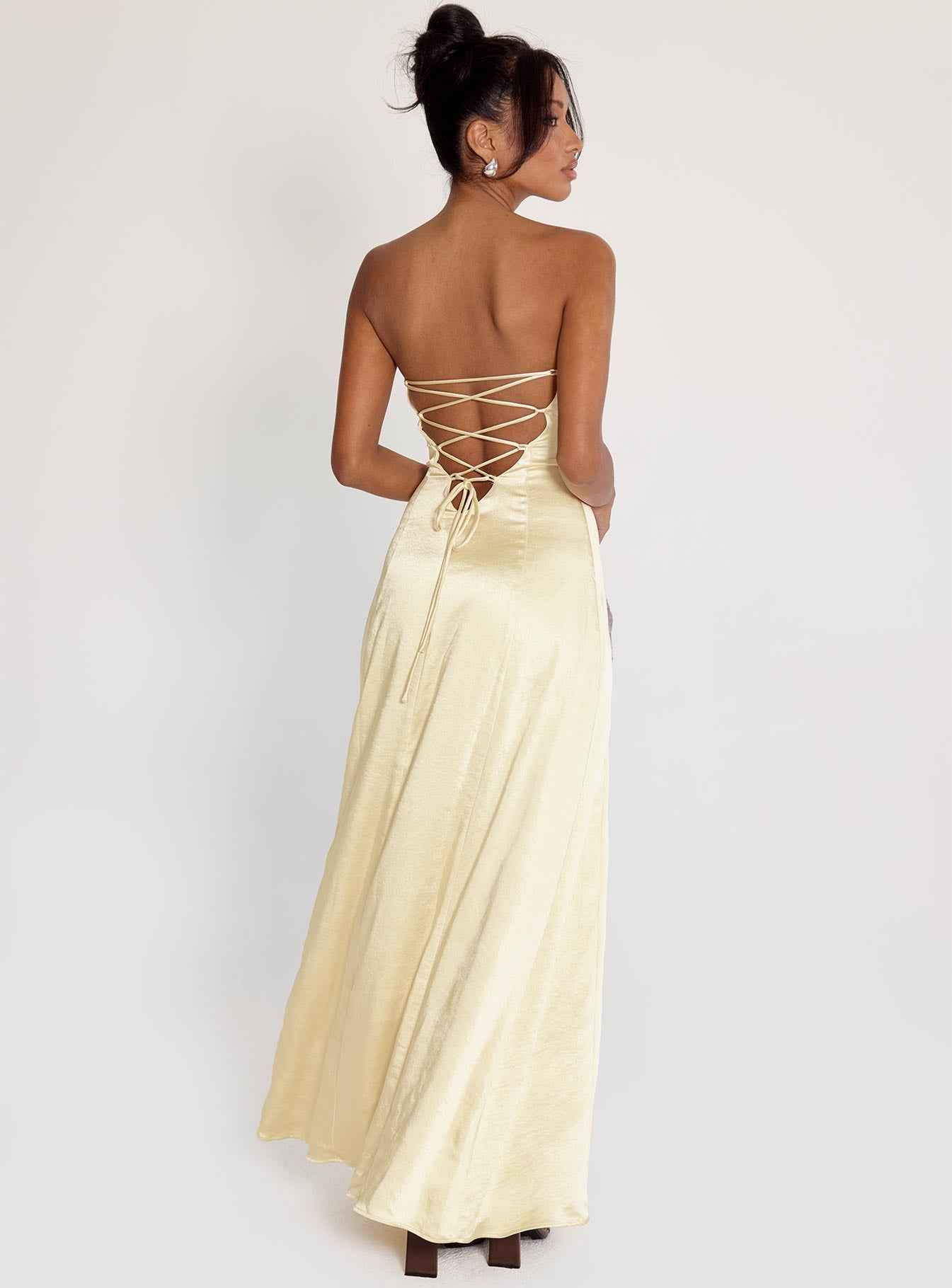 back view of model wearing Princess Polly Masterpiece Strapless Maxi Dress Yellow Straight Neck 