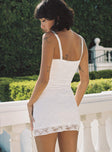 Lace mini dress Fixed shoulder straps, scooped neckline, invisible zip fastening down side Good stretch, fully lined