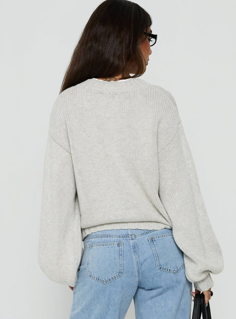 Presenting the Edern Cardigan Light Grey Marle womens-jumpers in short oversized back view of model wearing