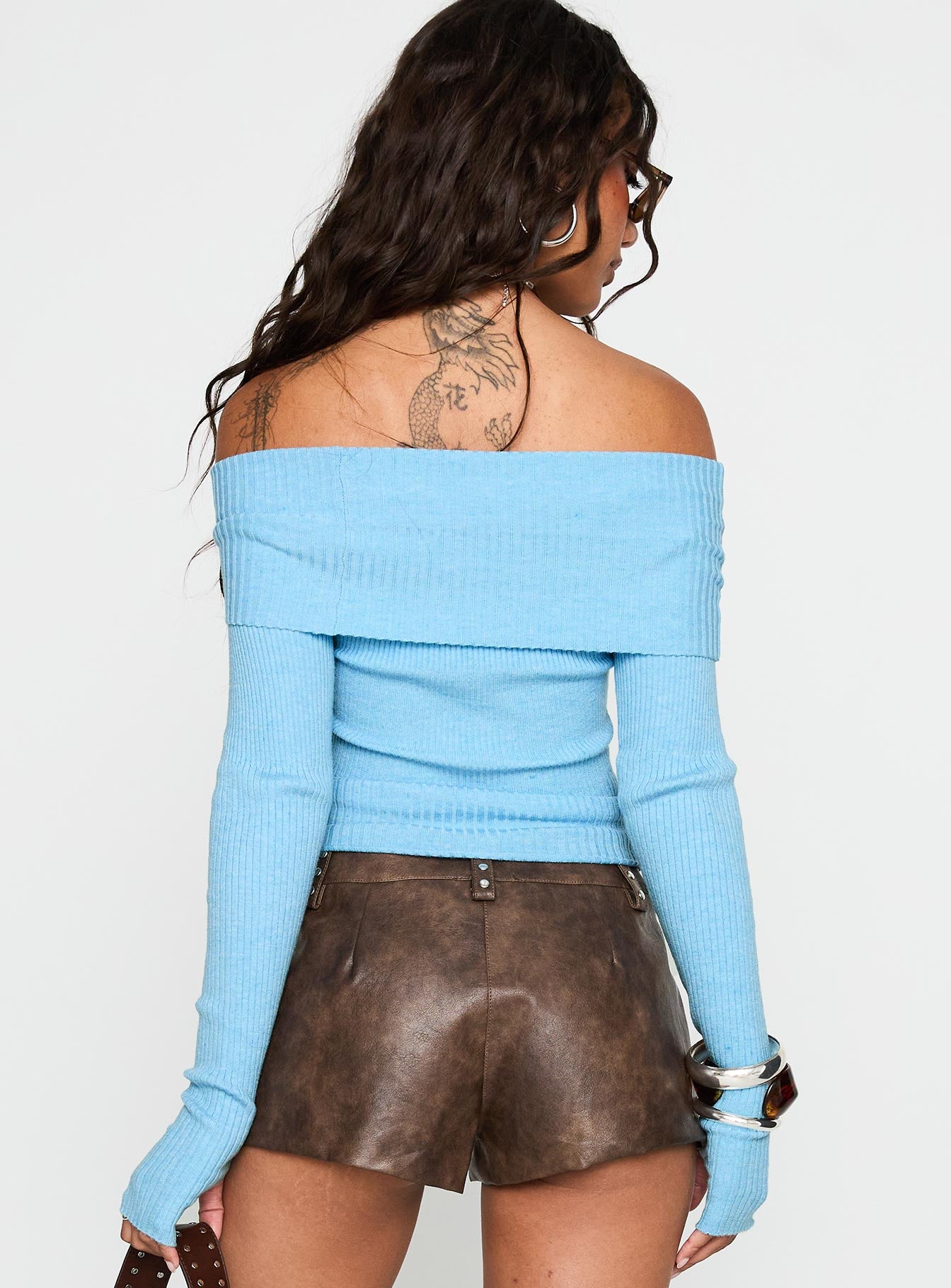 back view of model wearing Princess Polly Morley Off Shoulder Sweater Blue Cropped 