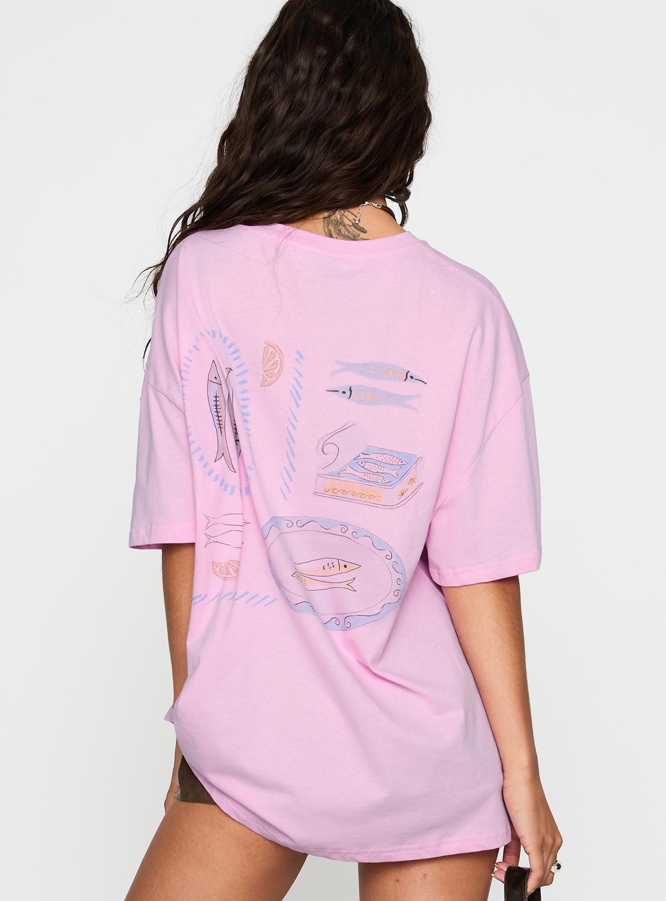 back view of model wearing Princess Polly Sardines Please Oversized Tee Pink Half Sleeves Crew Neck 