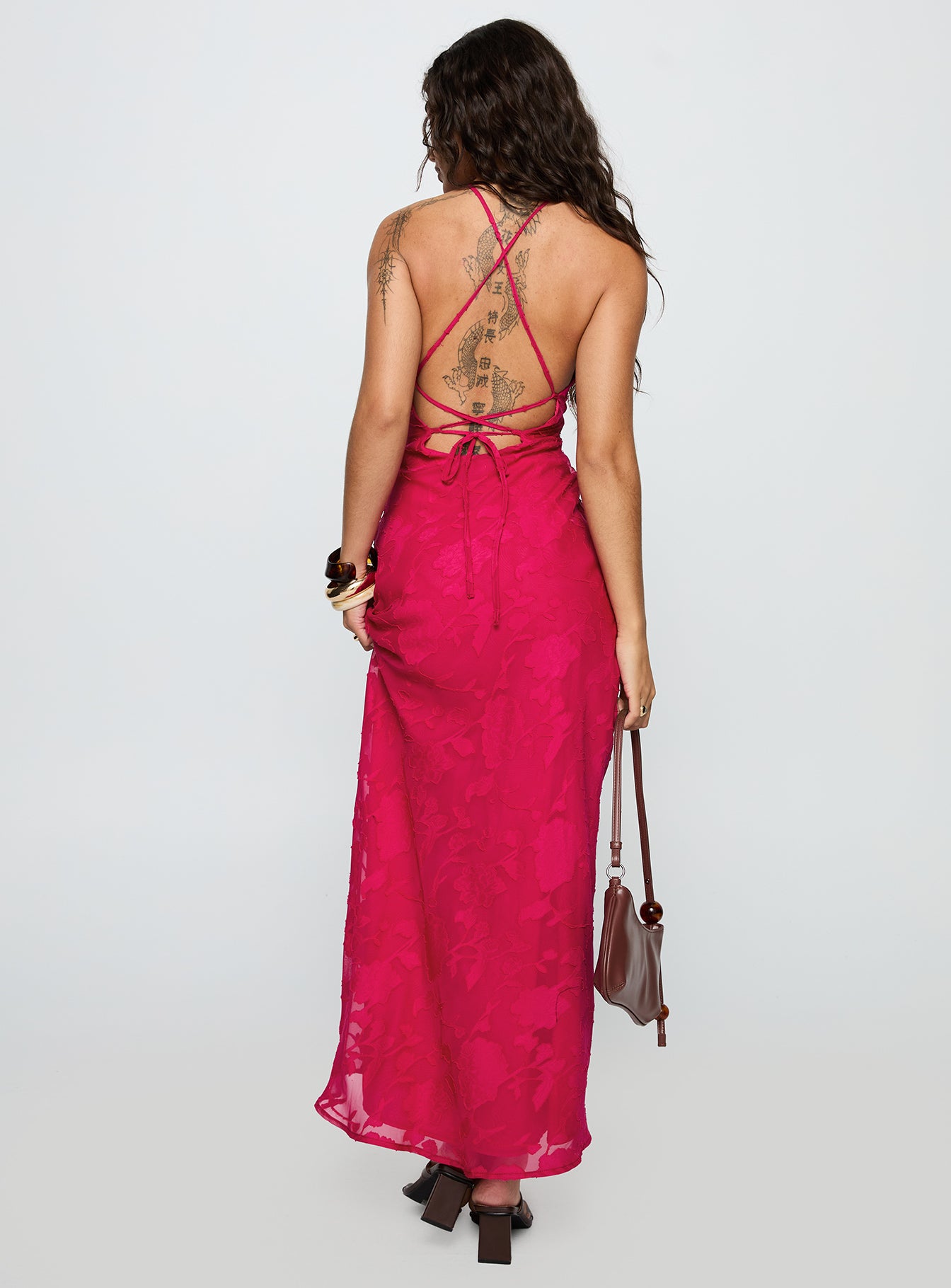 back view of model wearing Princess Polly Magnetic Halter Maxi Dress Hot Pink Crew Neck 