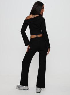 back view of model wearing Princess Polly Try Me Knit Pants Black Low Rise Pants 