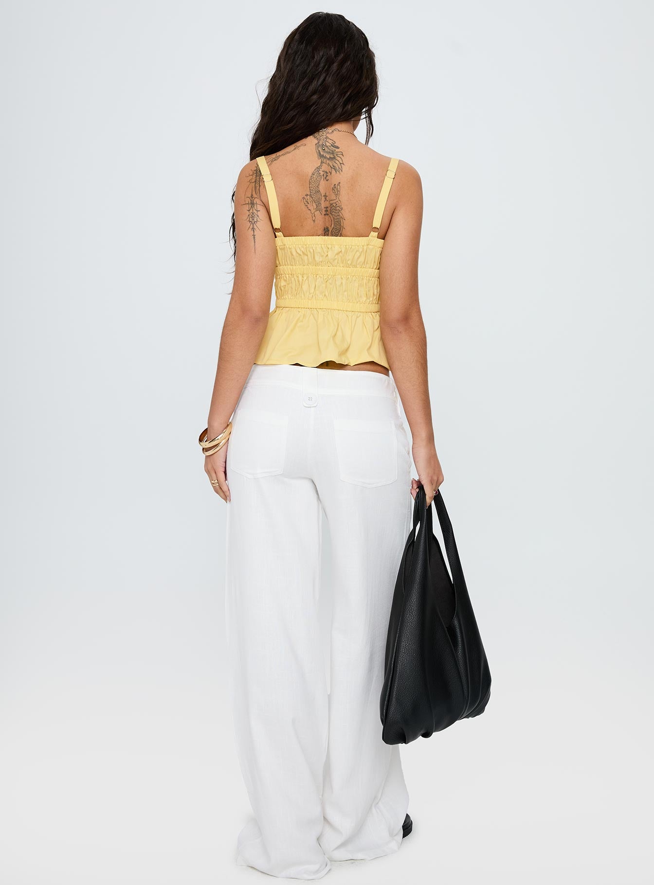 back view of model wearing Princess Polly Pedra Wide Leg Pant White Low Rise Pants 