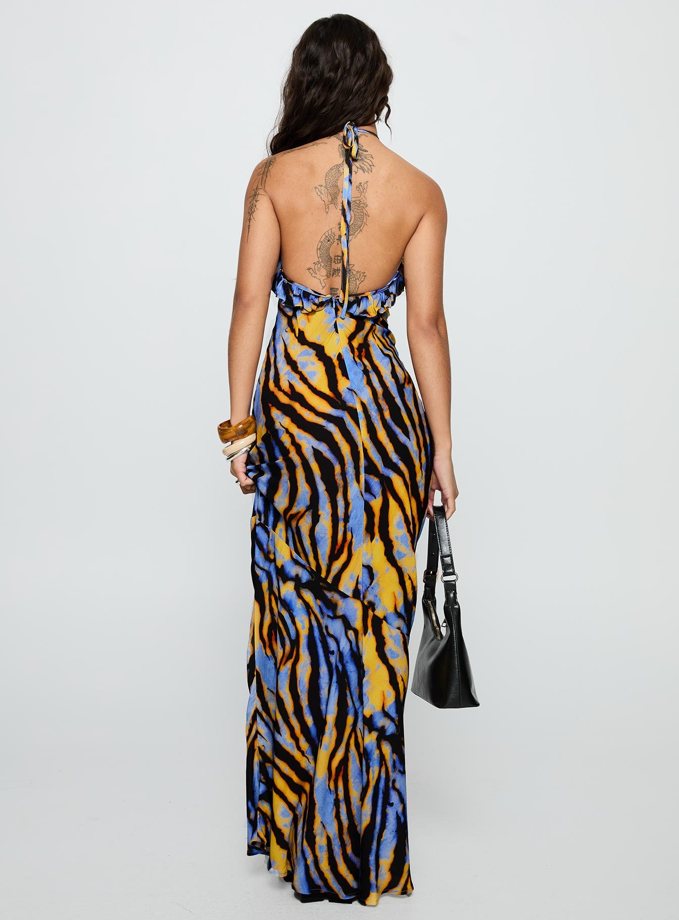 back view of model wearing Princess Polly Virginia Beach Backless Maxi Dress Blue Zebra High Neck 
