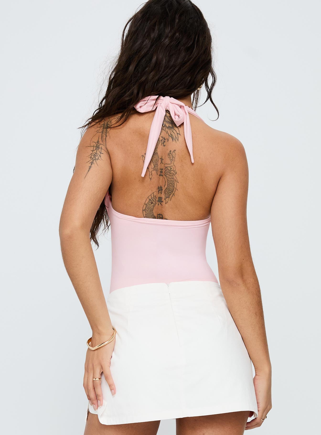 back view of model wearing Princess Polly Swaying Buckle Detail Bodysuit Pink Sleeveless 
