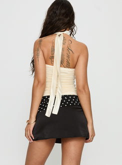 back view of model wearing Princess Polly Savour it Contrast Mini Skirt Black / Polka Dot Mini Skirts 