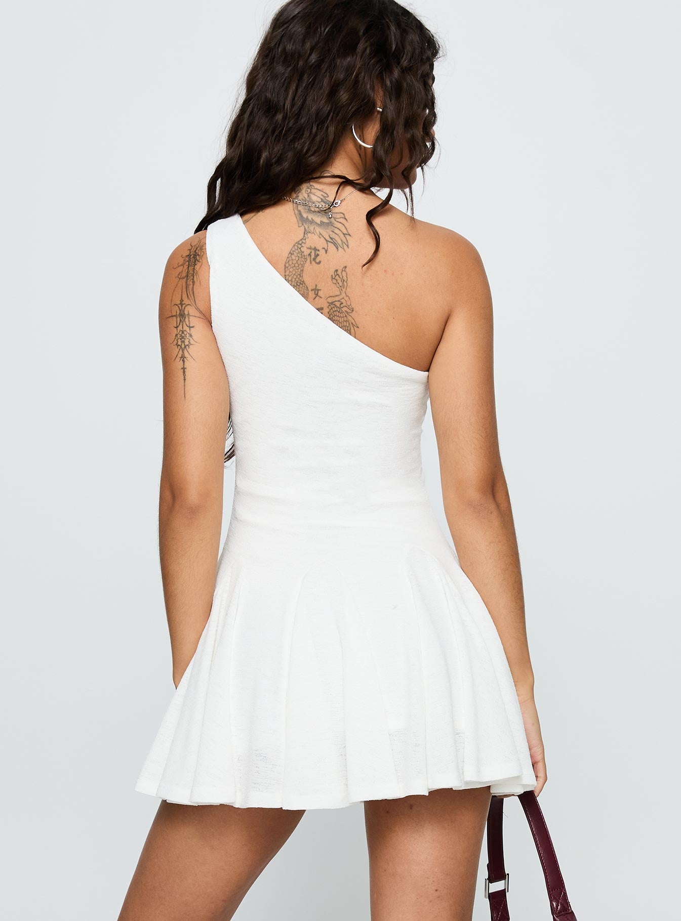 back view of model wearing Princess Polly Writing Vows One Shoulder Mini Dress White Asymmetric Neckline 