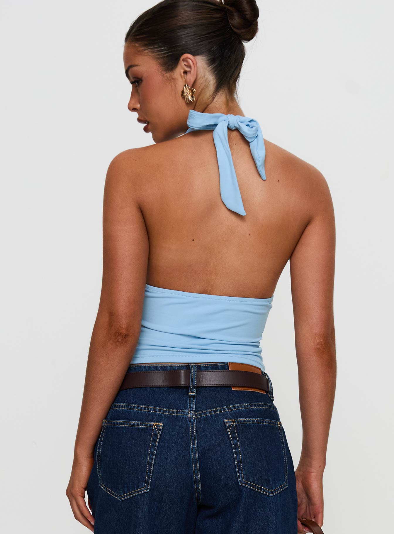 back view of model wearing Princess Polly Whimsy Halter Top Blue Sleeveless Plunger 