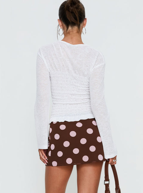 back view of model wearing Princess Polly Adelaida Mini Skirt Brown / Pink Polka Mini Skirts 