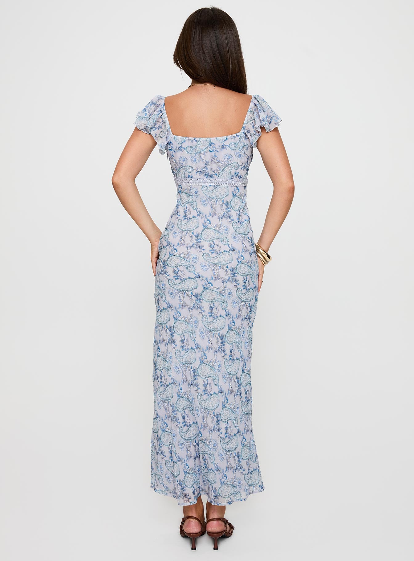 back view of model wearing Princess Polly Dahleia Maxi Dress Blue Paisley V-Neck 
