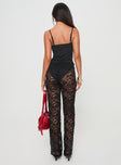 back view of model wearing Princess Polly Peru Lace Pants Black Low Rise Pants 