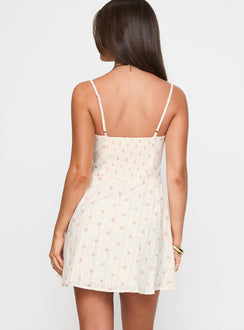 back view of model wearing Princess Polly Toulouse Mini Dress Cream / Floral Scoop Neck 