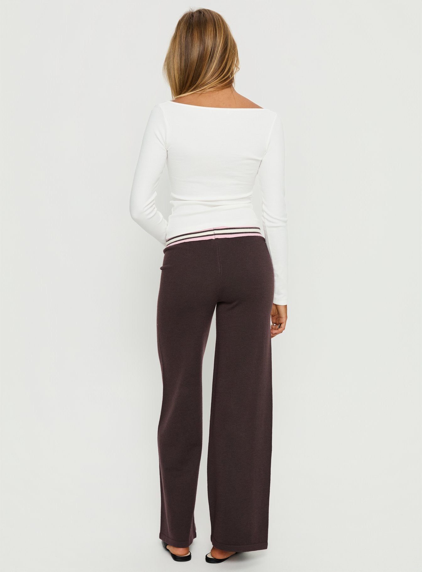 back view of model wearing Princess Polly Felisha Low Waist Knit Pants Brown Low Rise Pants 