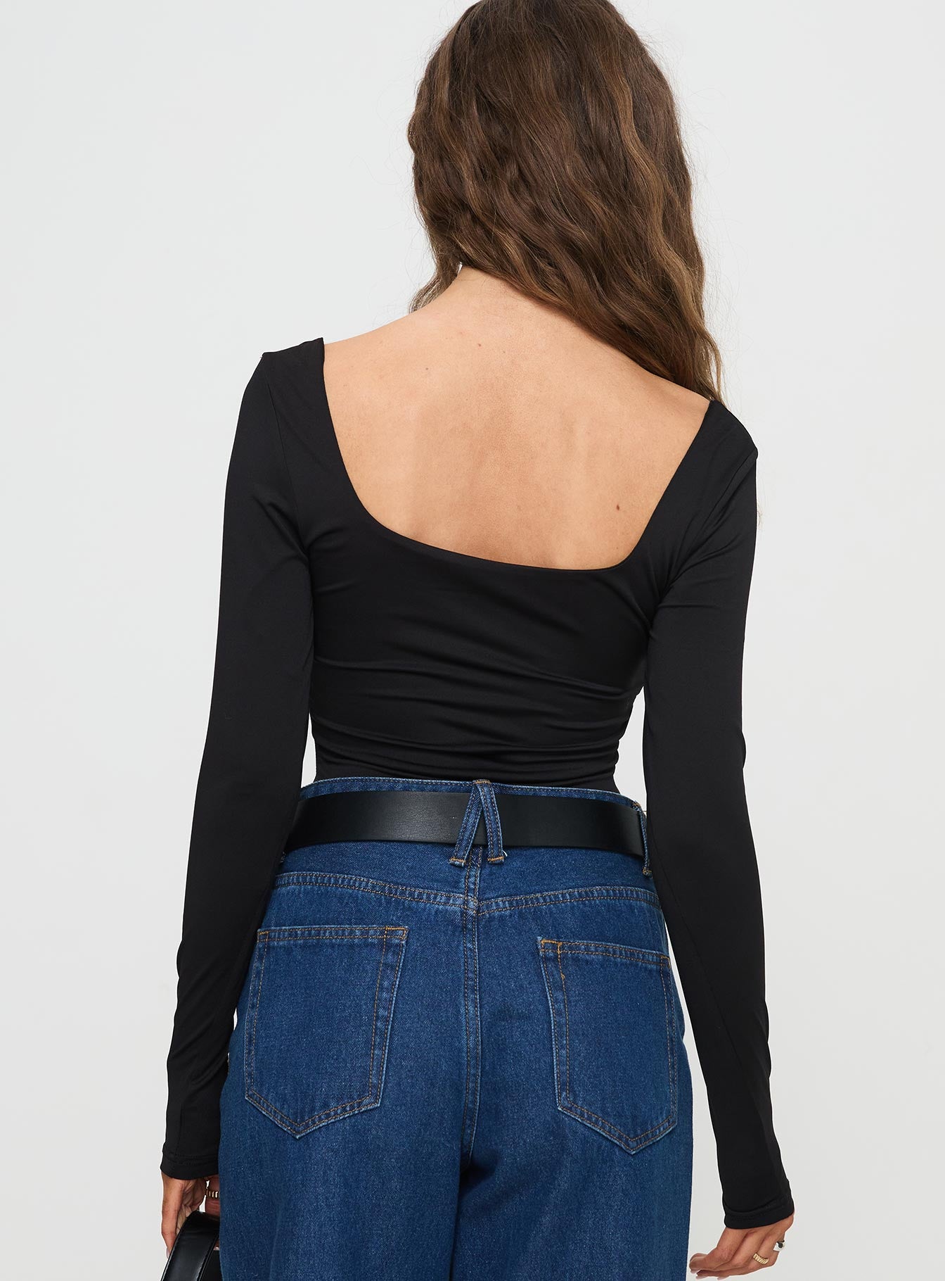 back view of model wearing Princess Polly Peekaboo Long Sleeve Bodysuit Black Full Sleeves Sweetheart 