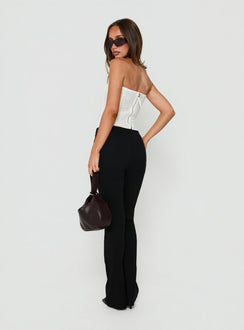 Experience the Zeni V Waist Bootleg Pants Black in womens-regular-pants with mid-rise back view of model wearing