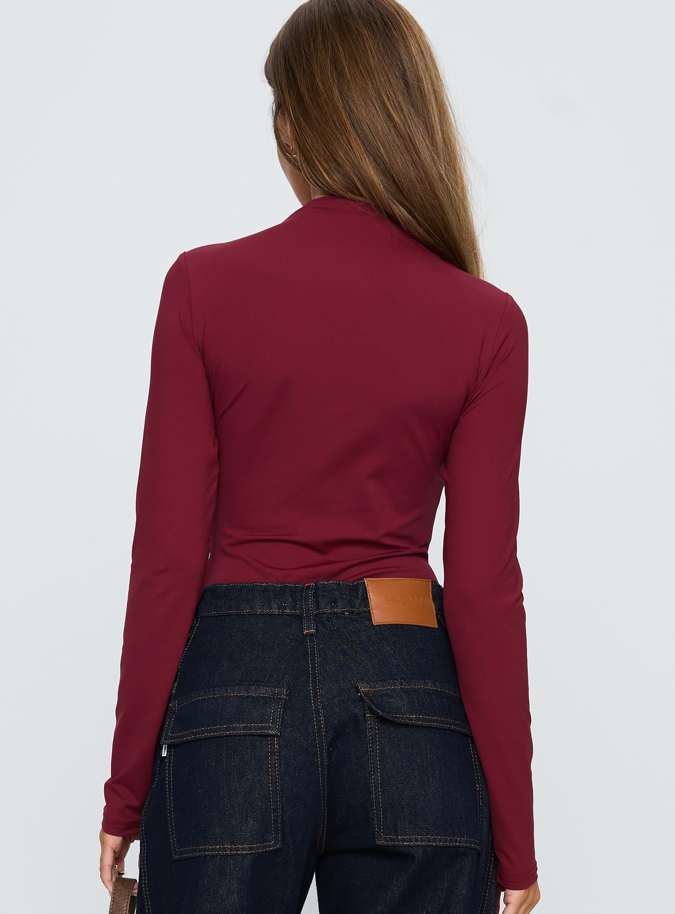 back view of model wearing Princess Polly Augustness Long Sleeve Bodysuit Burgundy Long Sleeve Tops 