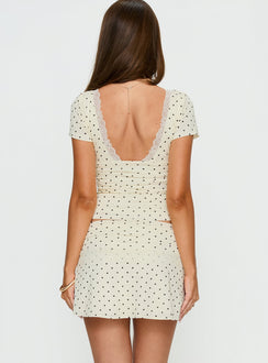back view of model wearing Princess Polly Amia Lace Mini Skirt Cream Polka Dot Mini Skirts 