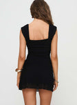 back view of model wearing Princess Polly Lanchester Mini Dress Black Petite Square Neck 