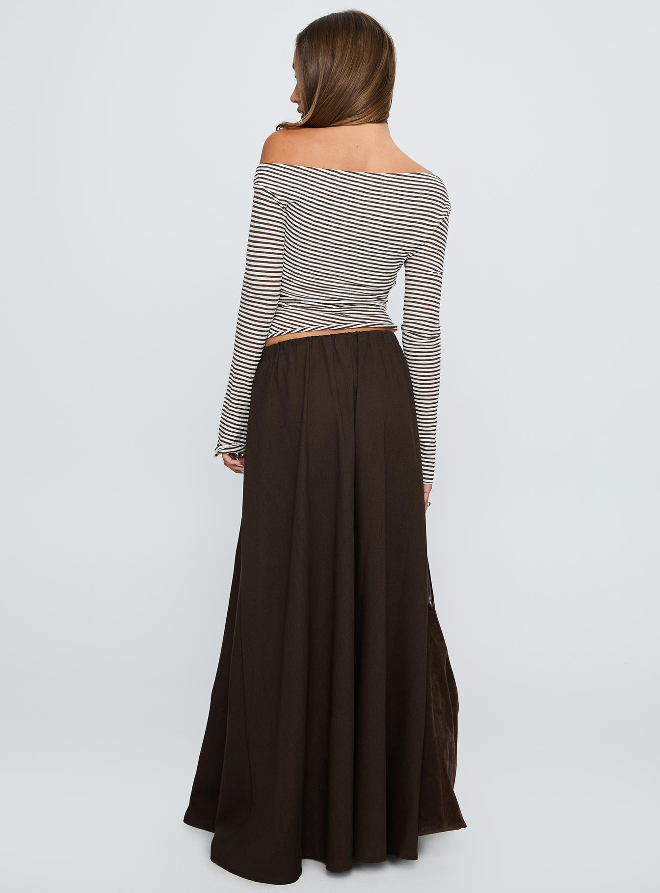 back view of model wearing Princess Polly Hallee Maxi Skirt Brown Maxi 