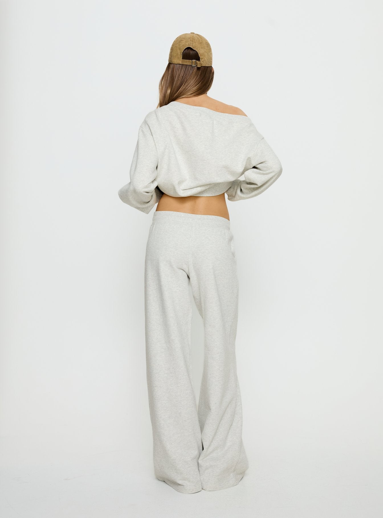 back view of model wearing Princess Polly Dodie Wide Leg Pants Grey Marle Mid Rise Pants 
