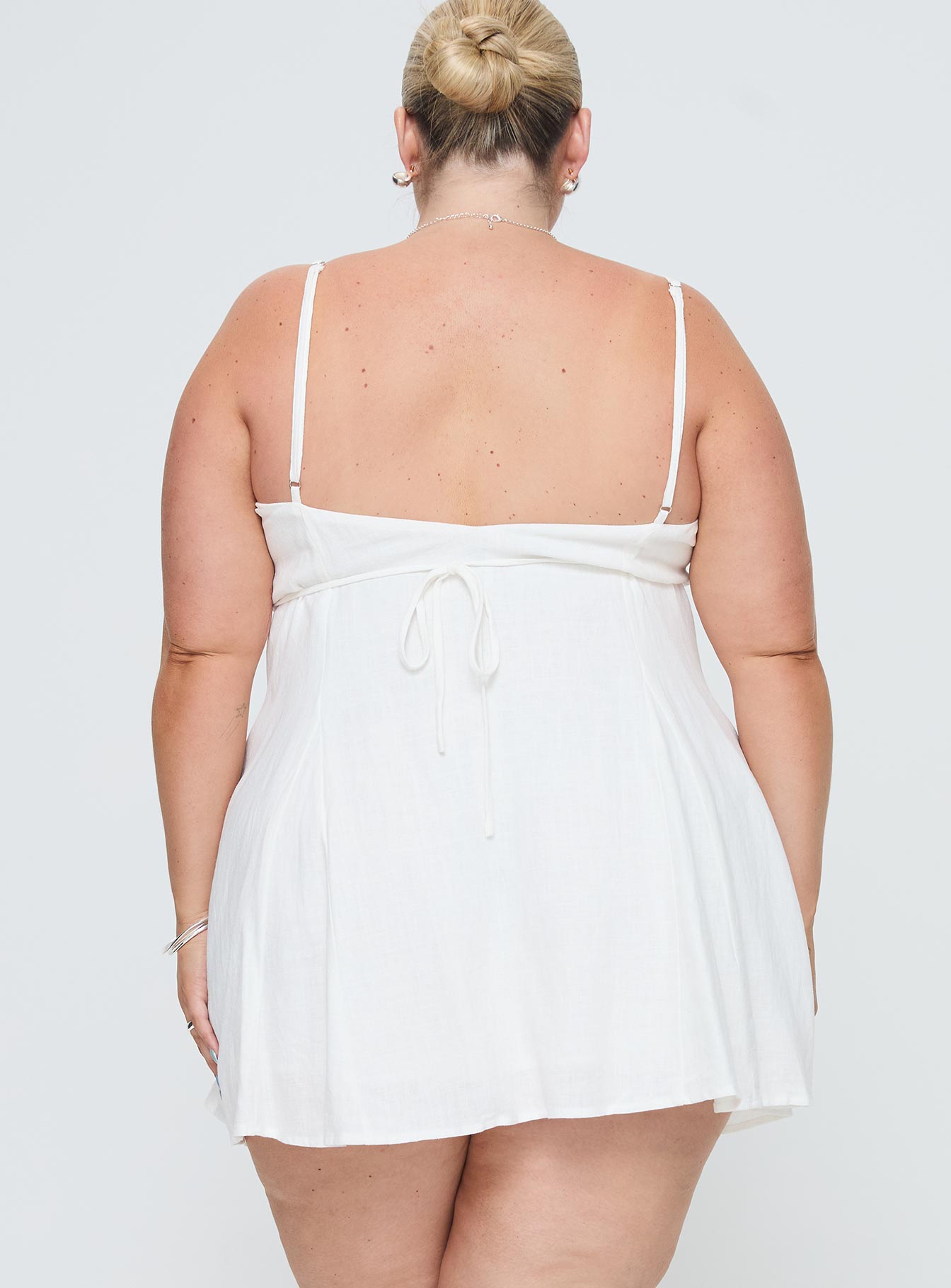 back view of model wearing Princess Polly Elian Linen Blend Mini Dress White Curve Square Neck 