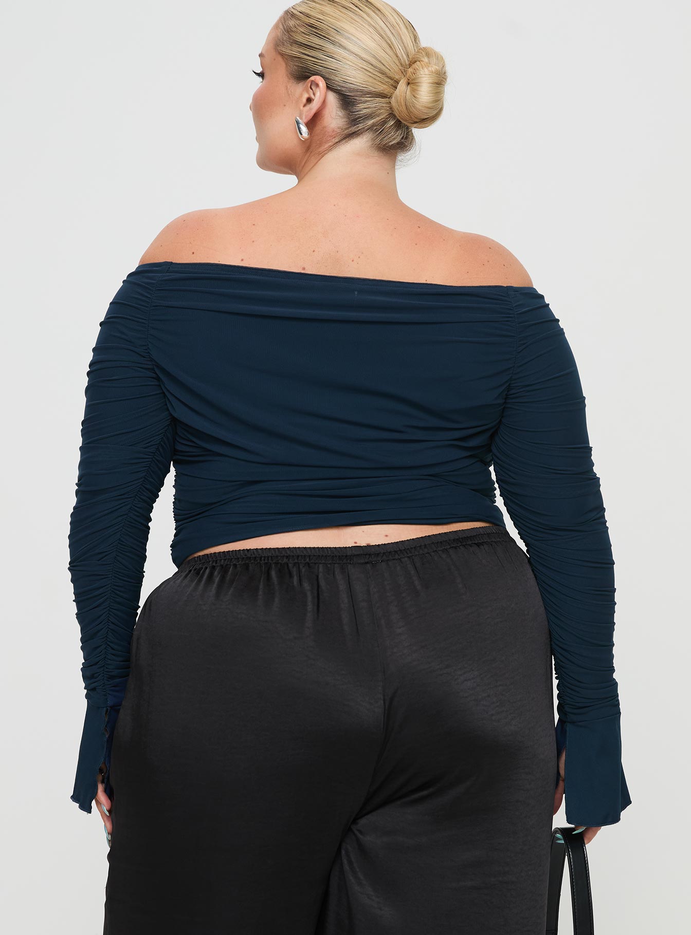 back view of model wearing Princess Polly Moreno Off The Shoulder Top Navy Curve Full Sleeves straight 